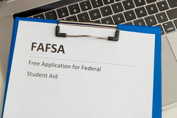 Fafsa. Student aid application form on the tablet.