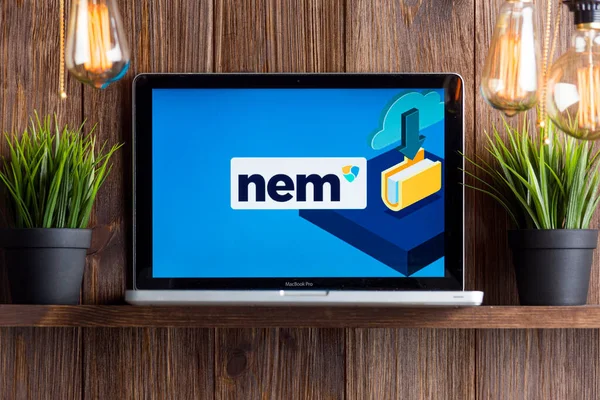 Tula Russia 16.01.20 nem wallet on the laptop screen isolated. — Stock Photo, Image