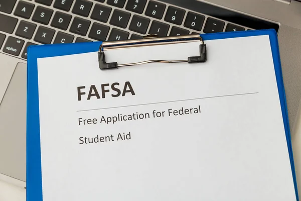 Fafsa. Student aid statement form and money on the tablet. — Stock Photo, Image