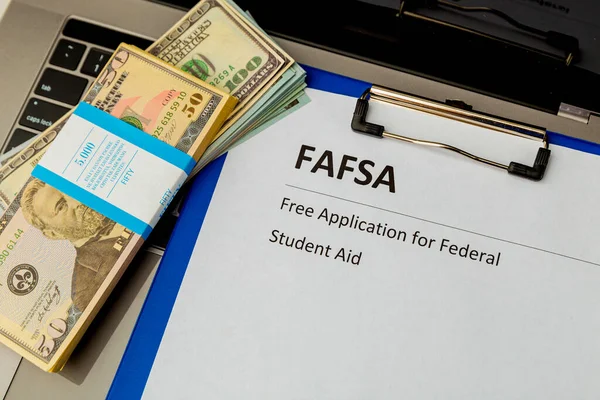 Fafsa. Student aid. Money on the table. — Stock Photo, Image