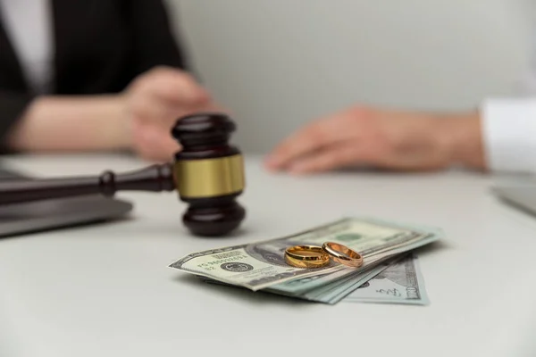 Legal alimony concept. Closeup view of wooden gavel and money. — Stock Photo, Image