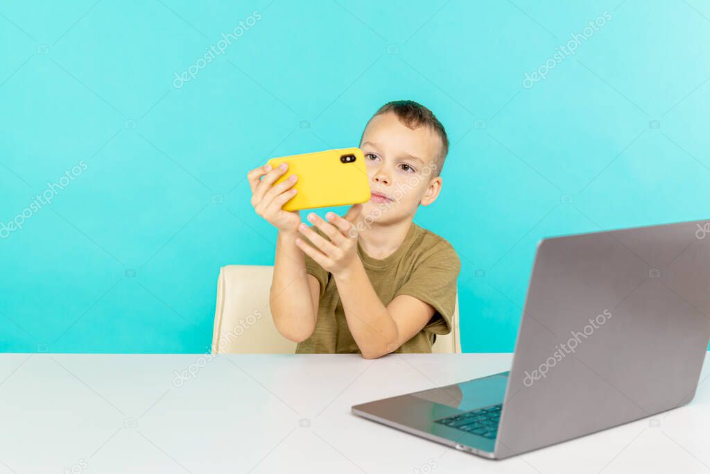 Boy using phone for video connection to do his homework isolated.