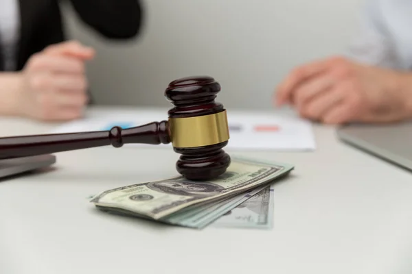 Legal alimony concept. Closeup view of wooden gavel and money. — Stock Photo, Image
