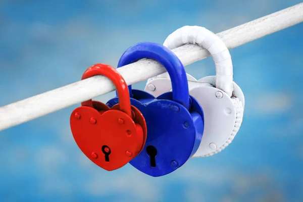 padlocks in the shape of a heart in the colors of the Russian flag