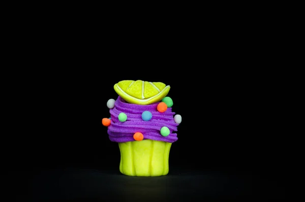 Plastelina cupcake w ciemności — Zdjęcie stockowe