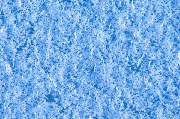 Kepingan salju di atas es . — Stok Foto