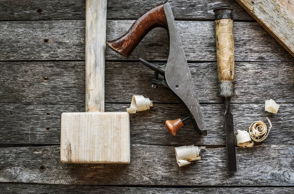 Carpentry tools on an old board table — Stock Photo, Image