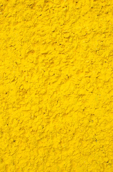 Concreto fundo pintado em amarelo — Fotografia de Stock