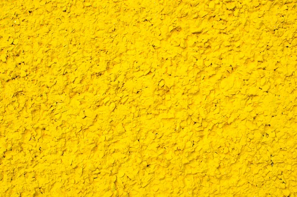 Concreto fundo pintado em amarelo — Fotografia de Stock