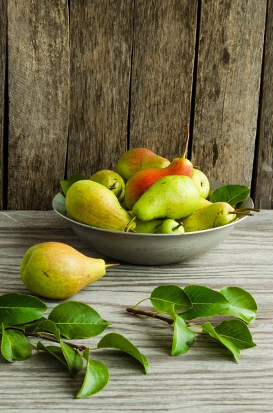 Pear fruits in the old aluminum dish — Stock Photo, Image