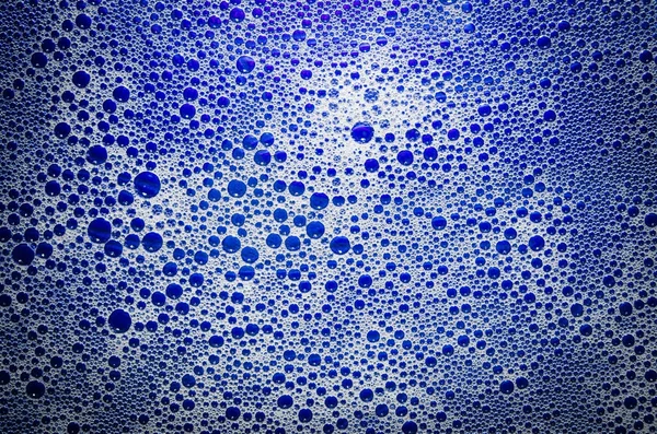 Latar belakang gelembung sabun biru abstrak — Stok Foto