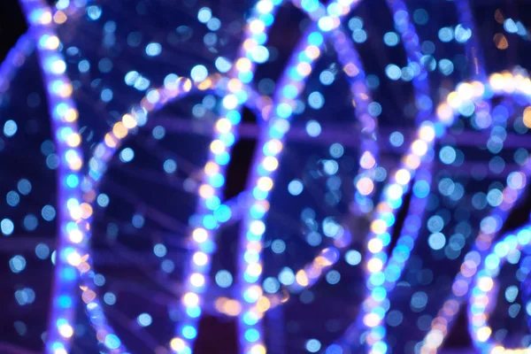 Soyut Noel arkaplanı, renkli çelenkler..