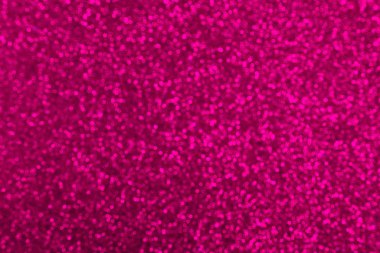 Bulanık pembe bokeh ile soyut arkaplan.