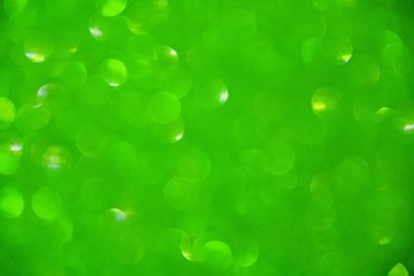 Bulanık bokeh yeşille soyut arkaplan.