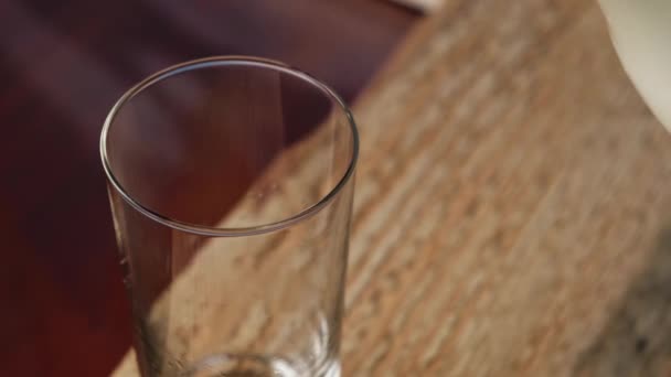 Homemade Cow Milk Poured Jug Glass Wooden Background — Stock Video