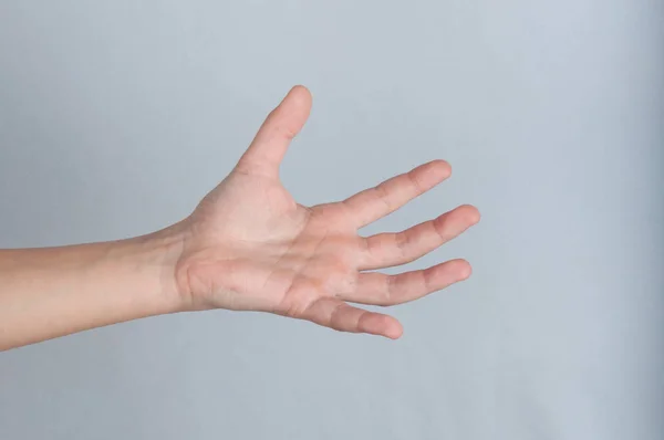 Human hand with splayed fingers