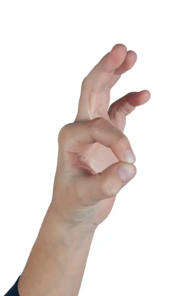 Lidská ruka ukazující izolované na bílém ok symbol — Stock fotografie