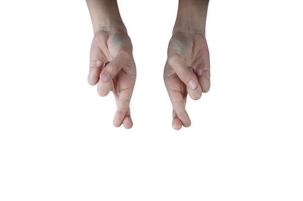 Human arms with fingers crossed hand sign isolated on white — Stock Photo, Image