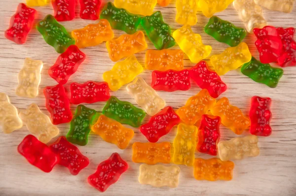 Halom vegyes sokszínű zselatin édesség-ra könnyű háttér — Stock Fotó