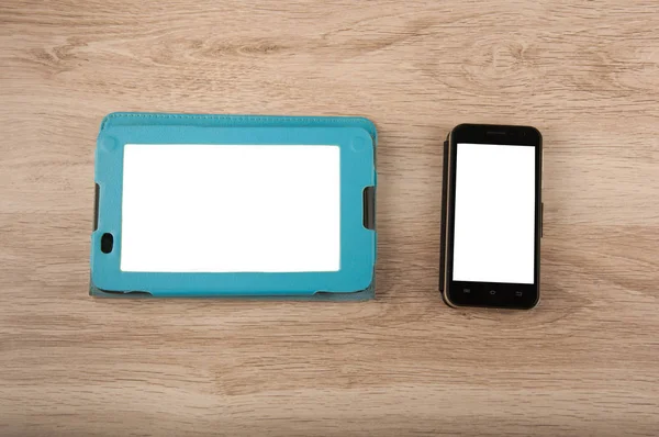 Digitales Tablet und Smartphone mit weißen Bildschirmen — Stockfoto