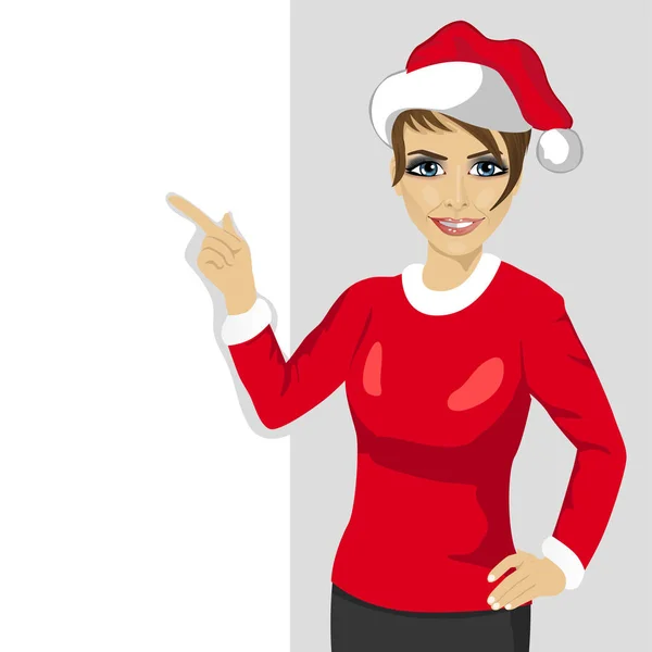 Jul kvinna i santa hatt pekar Tom kartong — Stock vektor
