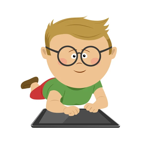 Nerd petit garçon avec des lunettes couché avec tablette informatique — Image vectorielle