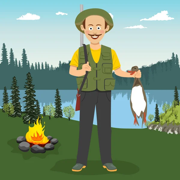 Happy hunter holding duck in his hands standing near campfire, lake or river in the evening — Stock Vector