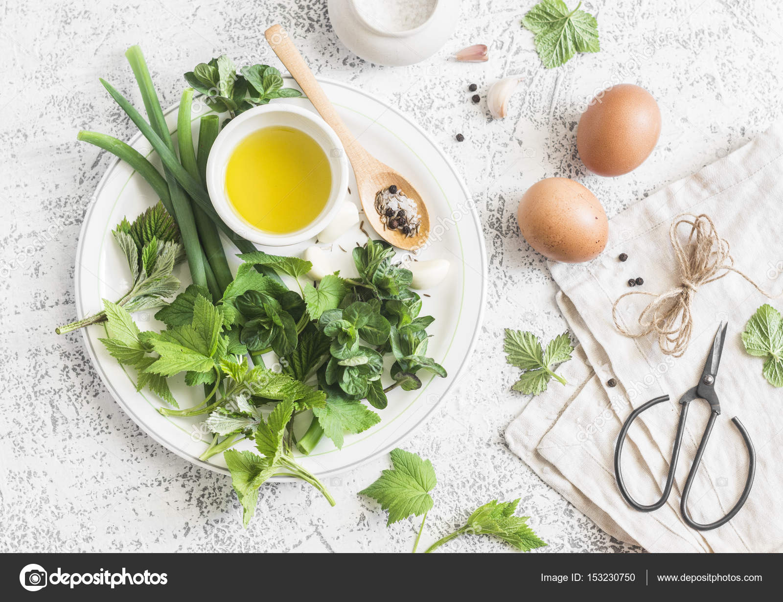 Garden herbs, spices and eggs rustic kitchen still life.On a light