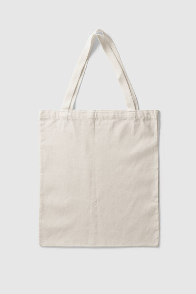 Blank Tote Canvas Bag Mockup on light grey background. High resolution.