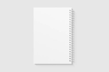 Gerçek fotoğraf, boş spiral kaplı not defteri şablonu, açık gri arka planda izole edilmiş. Yüksek çözünürlük.