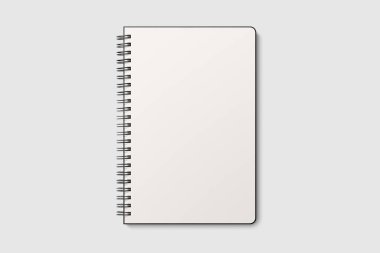 Gerçek fotoğraf, spiral kaplı model şablon, açık gri arka planda izole edilmiş siyah kağıt kapaklı. Yüksek çözünürlük.