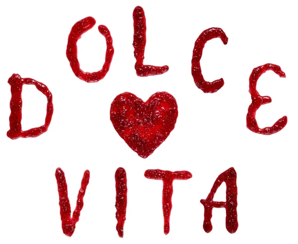 Frase italiana "dolce vita" (doce vida) ortografia com compota Fotos De Bancos De Imagens Sem Royalties