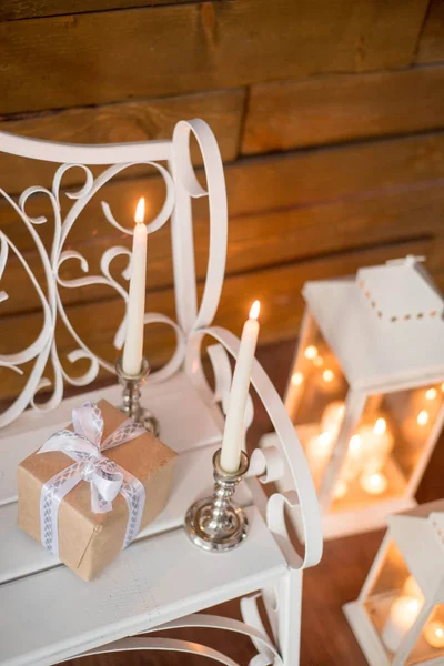 Christmas candles burning at New Year's Eve on wooden stairs. — Stock Photo, Image