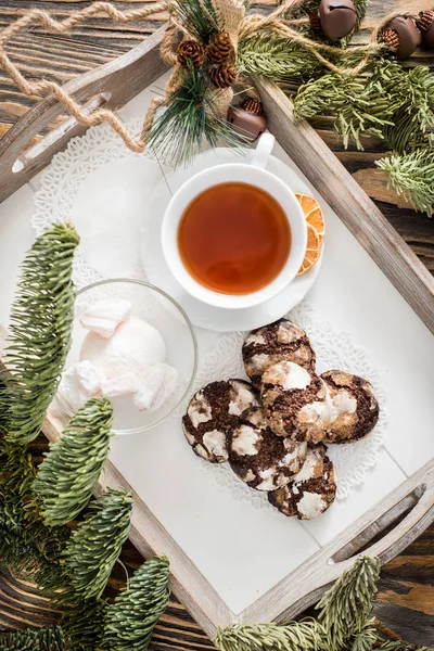 Chocolate cookies. Cookie with cracks. Cracked chocolate biscuits. Christmas chocolate cookies. Christmas biscuits. Chocolate cookies with cracks.