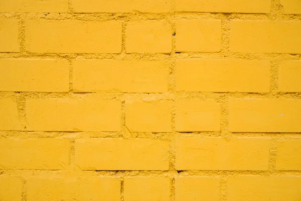 Bright Yellow brick wall background in rural room, — Stock Photo, Image