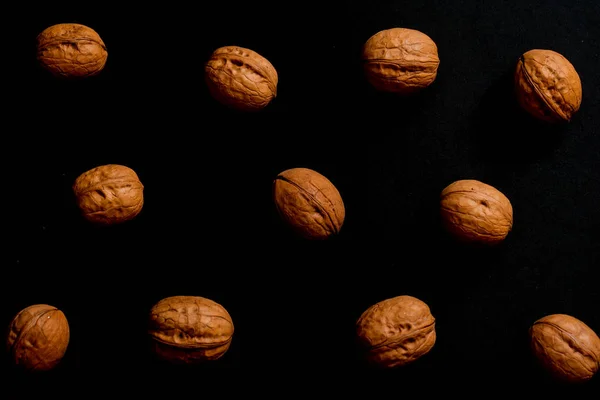 Walnuts isolated on black background — Stock Photo, Image