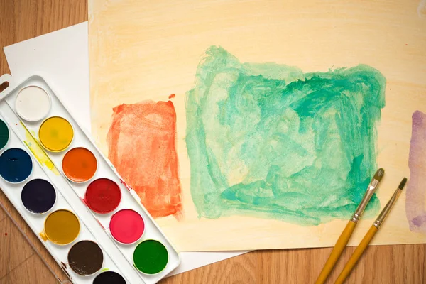 Kinderen tekening water kleur verf op een papier — Stockfoto