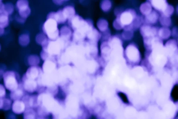 Foto von Bokeh-Lichtern auf schwarzem Hintergrund. Blaulicht, Neonlicht Discofarbe. — Stockfoto