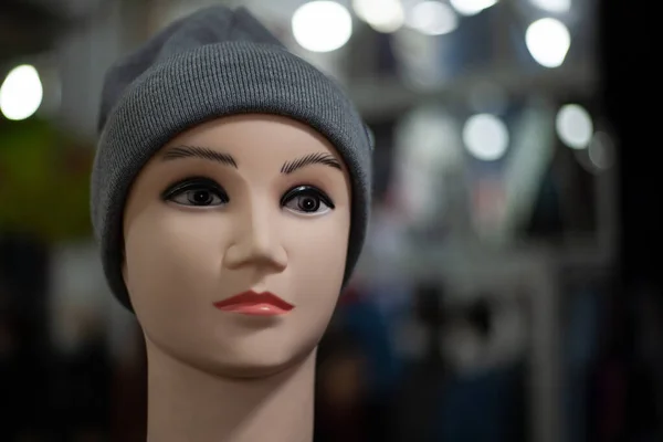 Mannequin female head in hat