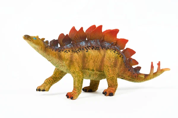 Dinozor lastik oyuncağı beyaza izole edilmiş.