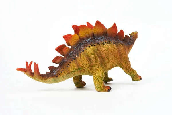 Dinozor lastik oyuncağı beyaza izole edilmiş.