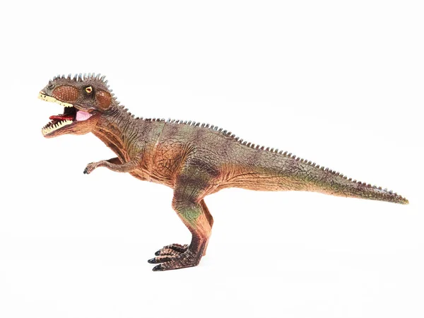 白に隔離されたティラノサウルスゴムのおもちゃ — ストック写真