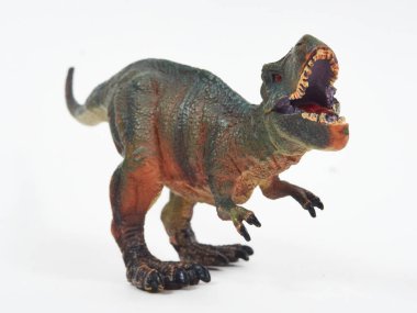 Tyrannosaur plastik oyuncağı beyaza izole edilmiş.