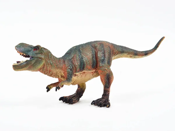 Tyrannosaur plastik oyuncağı beyaza izole edilmiş.