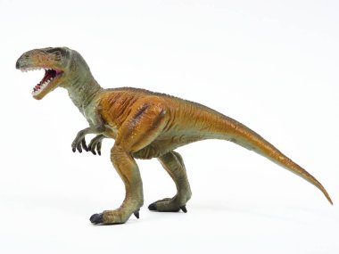 Tyrannosaur plastik oyuncağı beyaza izole edilmiş.