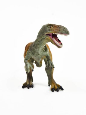 Tyrannosaur plastik oyuncağı beyaza izole edilmiş.