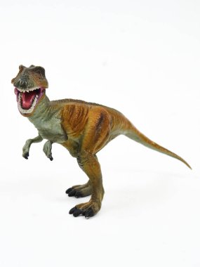 Tyrannosaur plastik oyuncağı beyaza izole edilmiş.