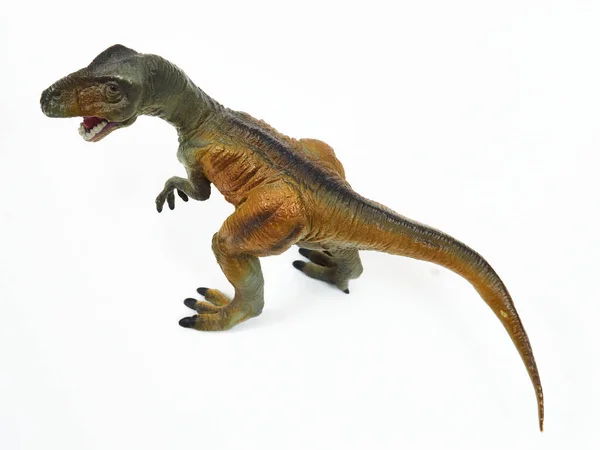 Tyrannosaur rubber toy isolated on white — Stock Photo, Image