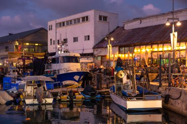Tel-Aviv Israel - 22 09 2018. Fish boats and yachts on the anchor inside Old Jaffa port