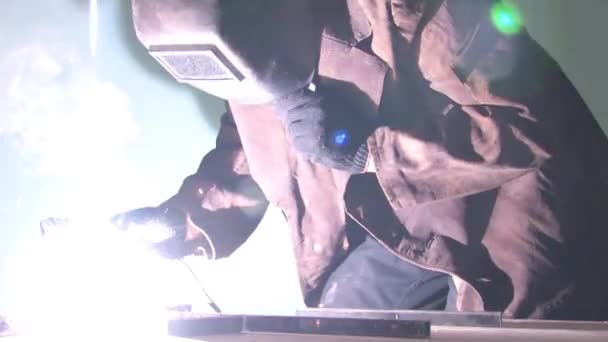 Working Welder Old Closed Welding Mask Performs Welding Work Electrodes — Stock Video
